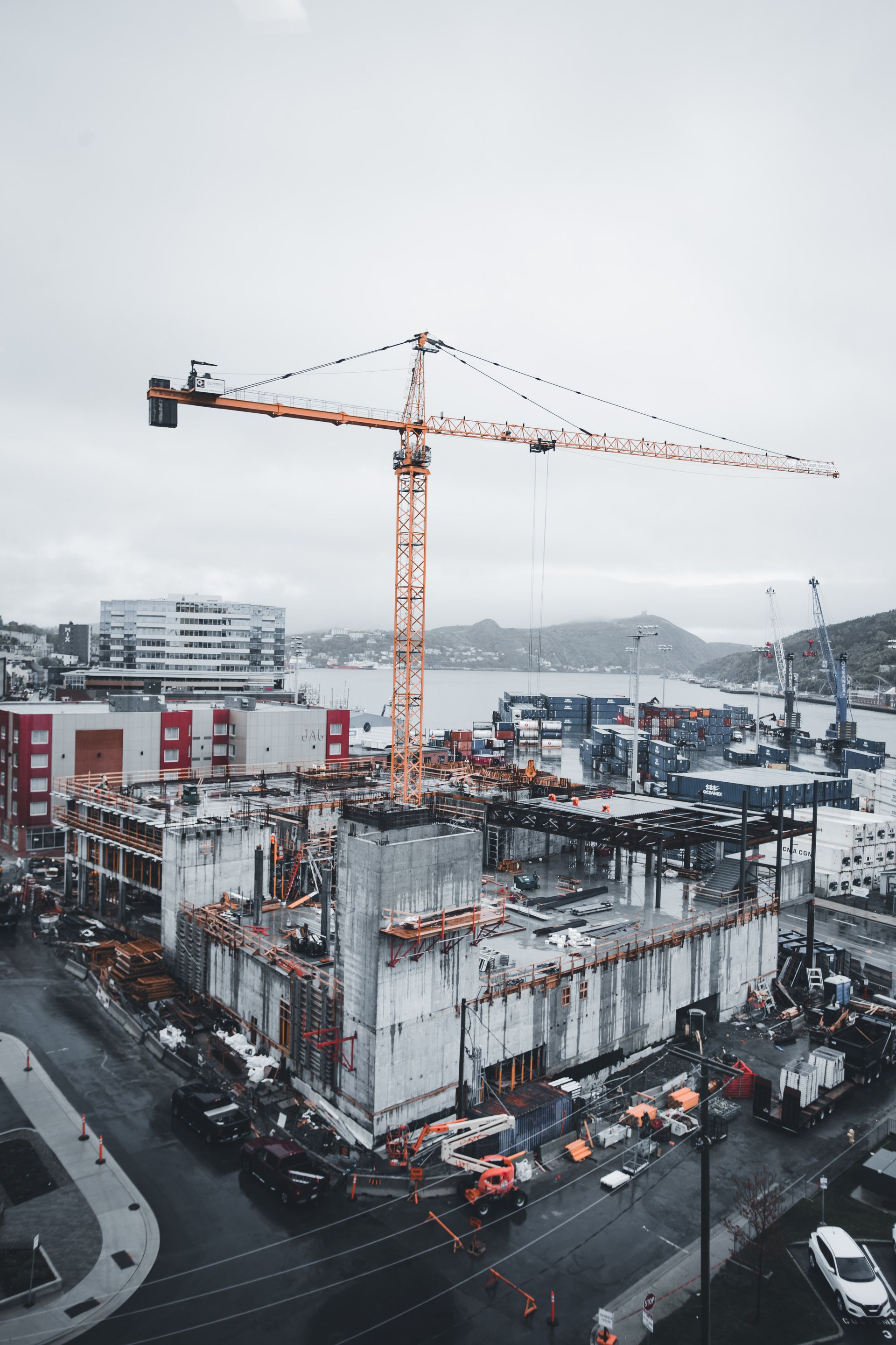Aerial view of construction near commercial buildings