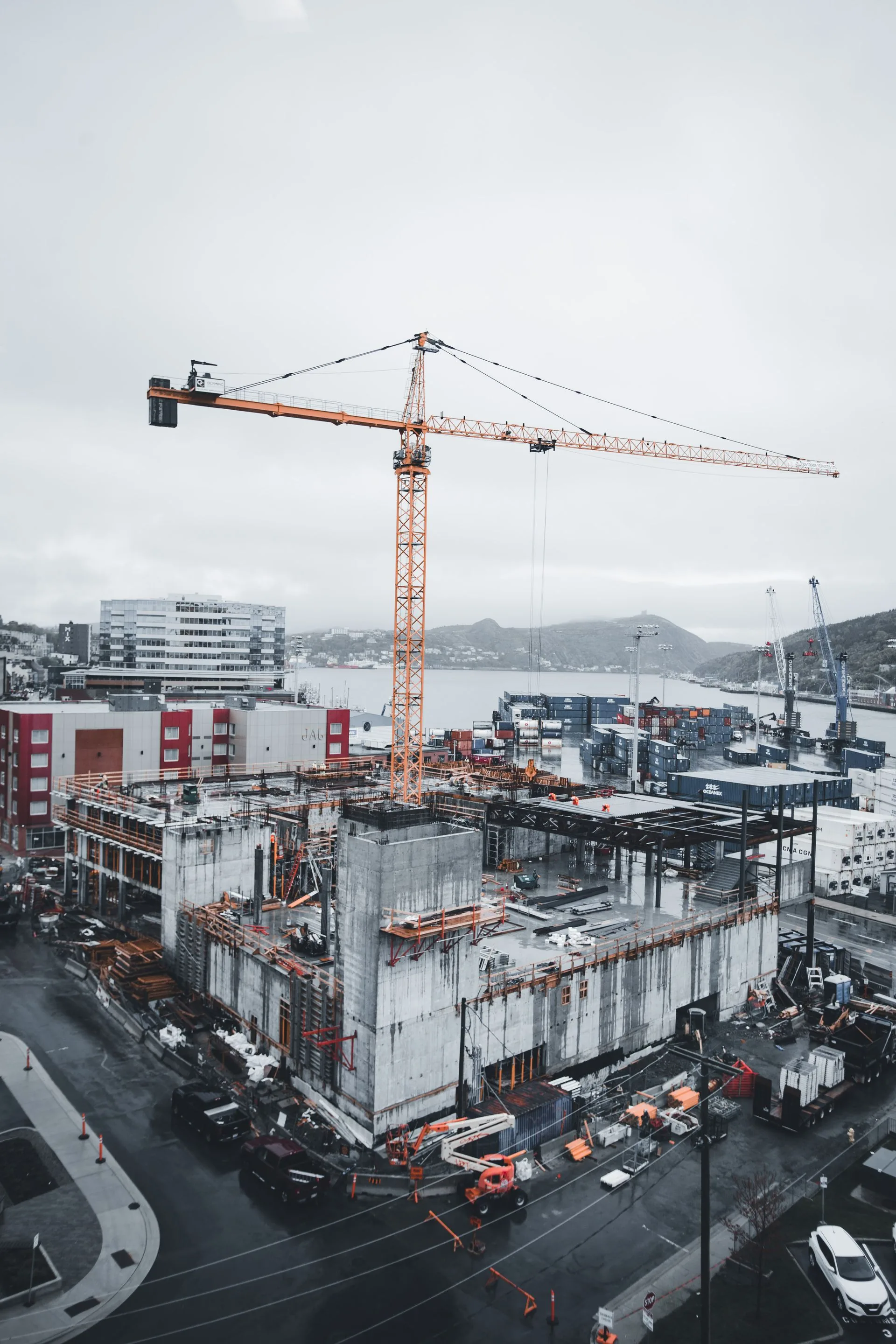 Aerial view of construction near commercial buildings