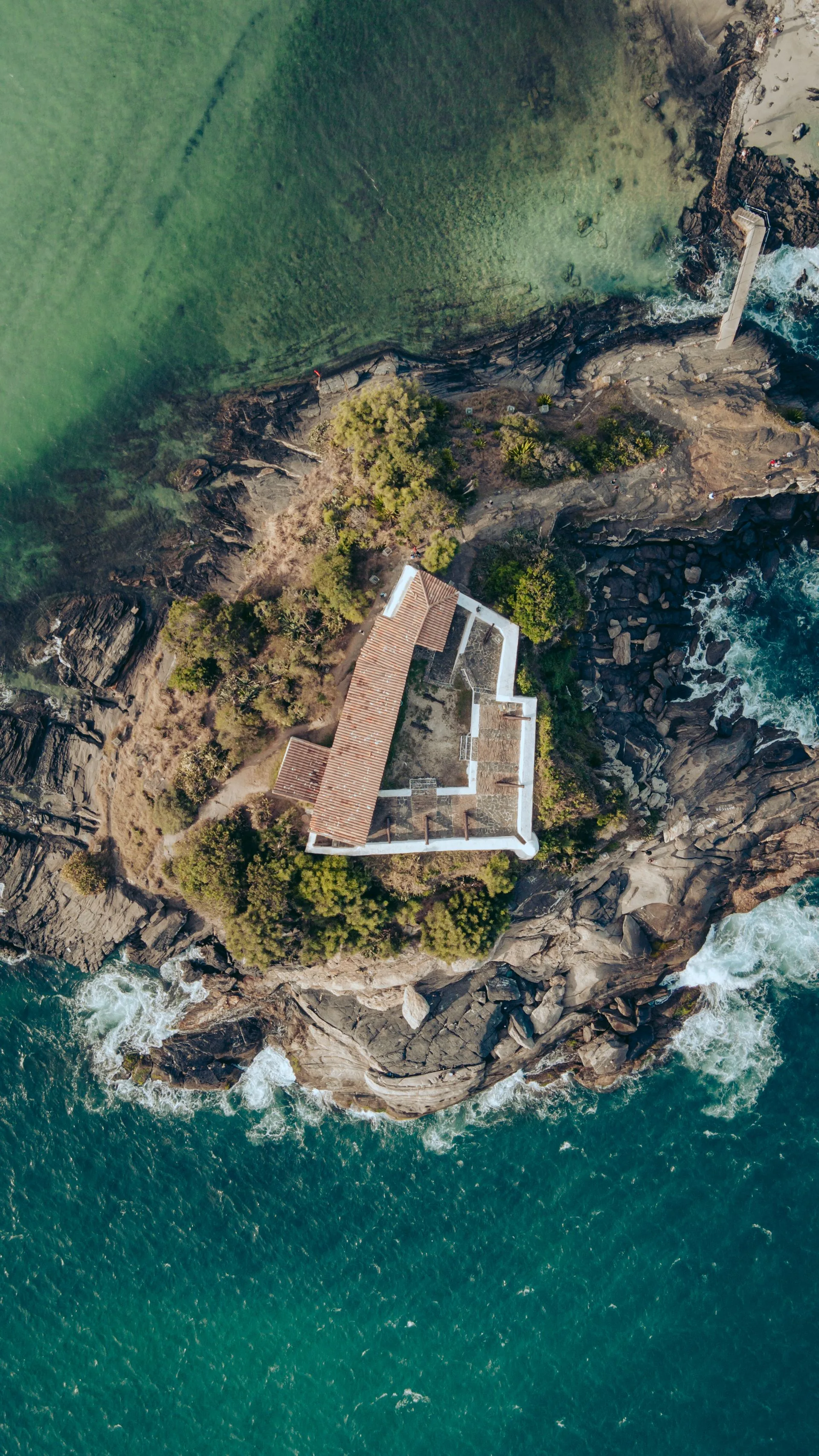 Aerial view of beach house on coast