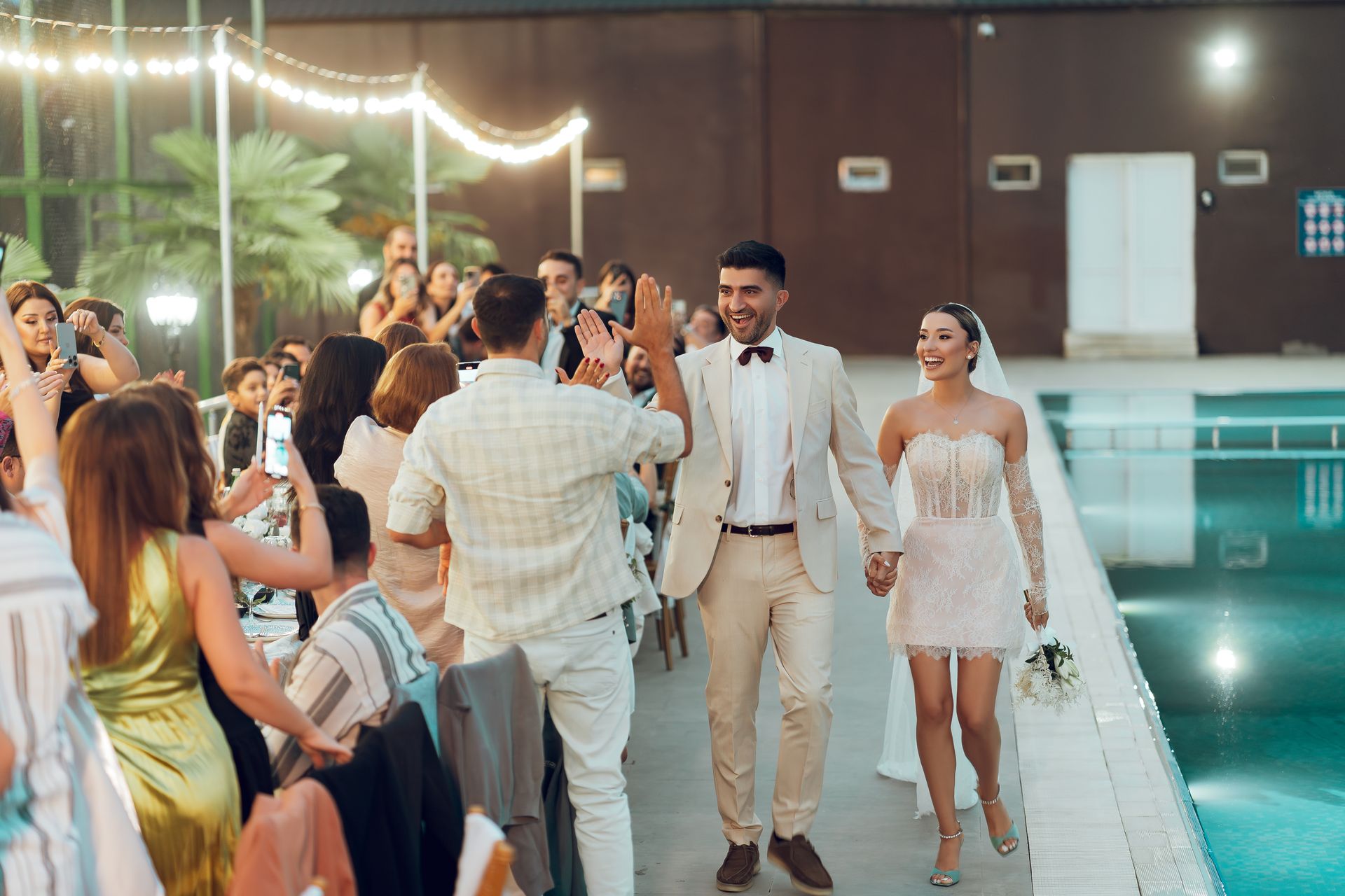 Elegant wedding celebration by the pool